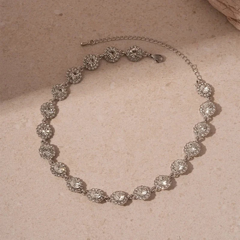 Collier ras-du-cou doré serti de cristaux couleur argent et strass, style rivière de diamants arc-en-ciel pour femme.